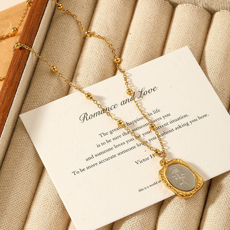 Rose carved in rectangle brick pendant necklace