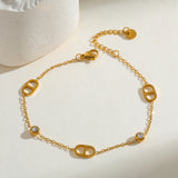 Interlocking D motifs and small crystals 18k gold plated bracelet